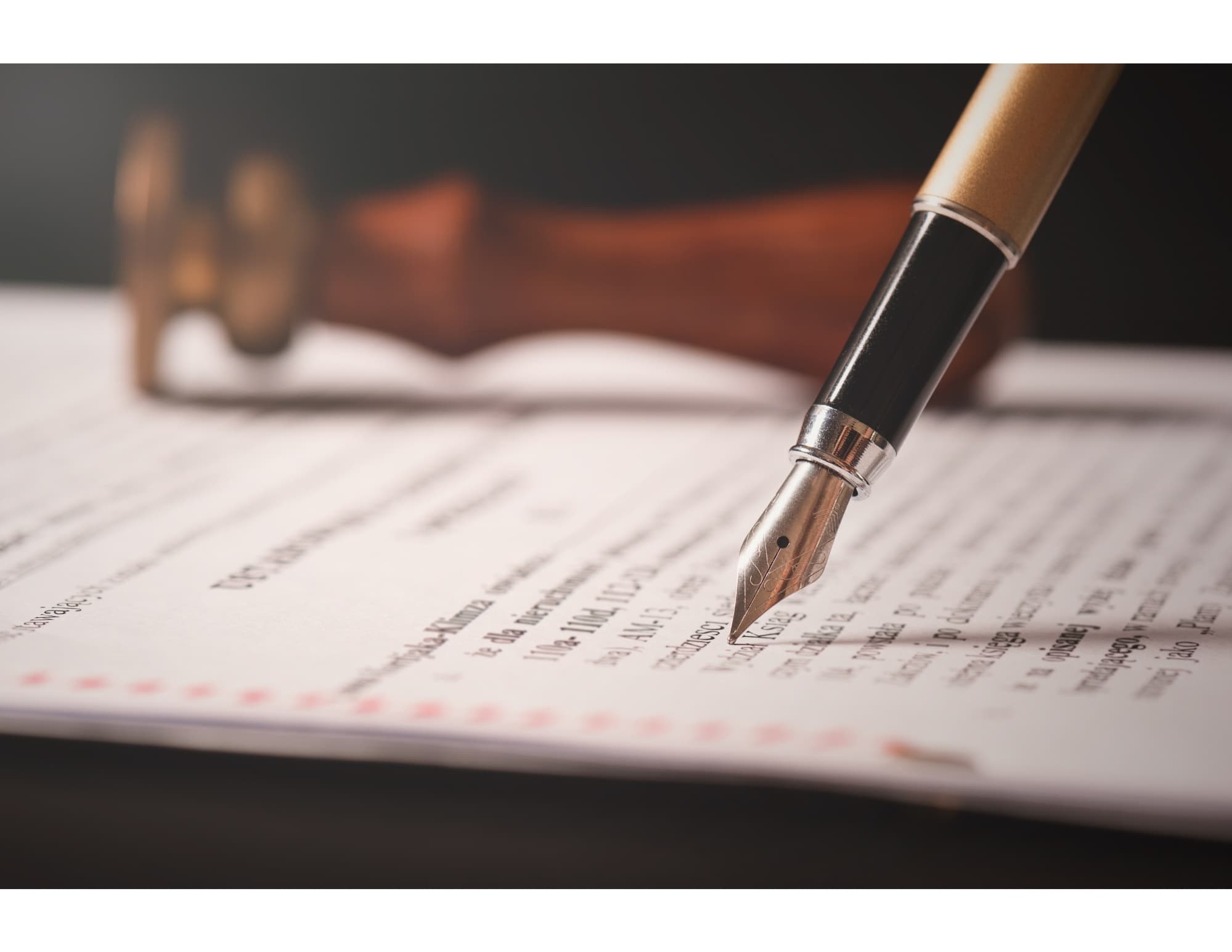 A fountain pen writing on paper