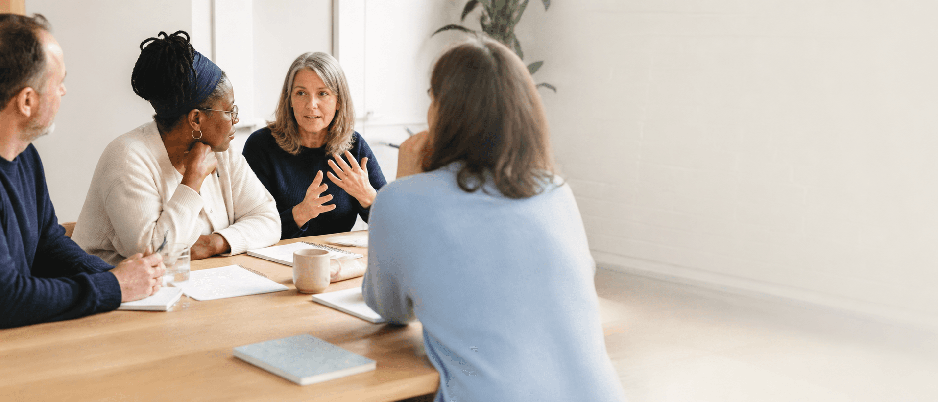 Partners talking together around a table